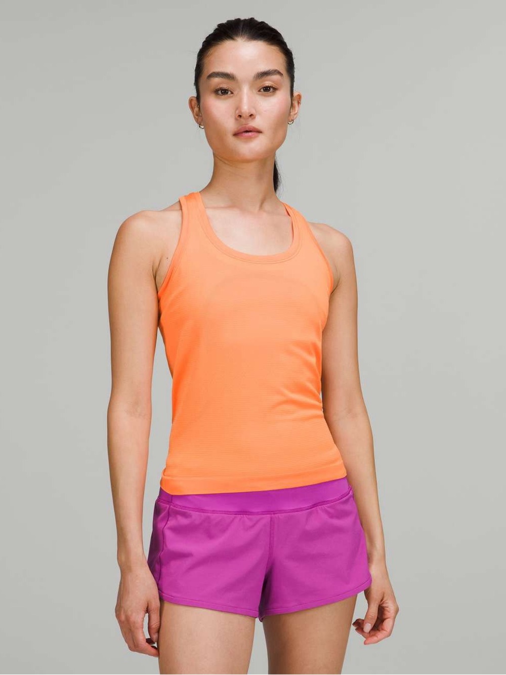005. Lululemon Swiftly Tech Racerback Tank Top 2.0 *Race Length Orange Soda 12